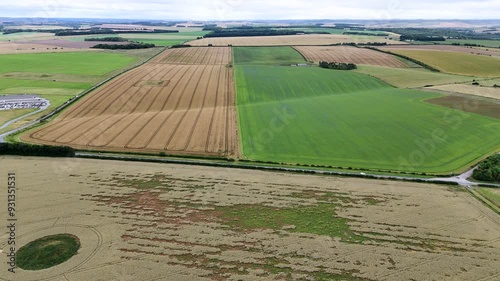 Establishing aerial view overlooking Salisbury farmland earthworks on rural stone henge countryside photo