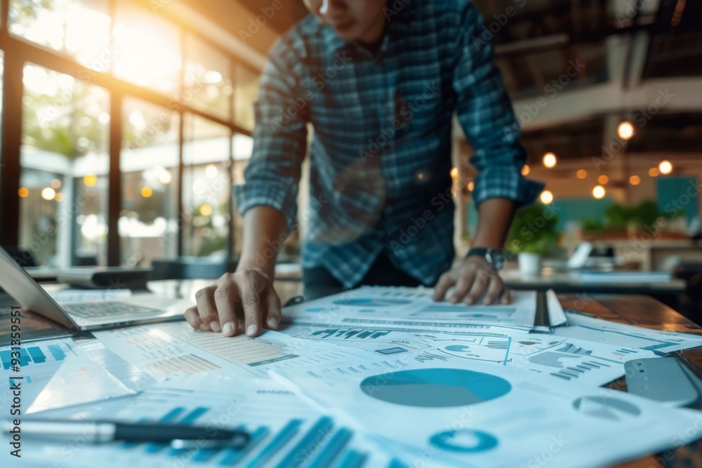Businessman working with charts Businessman working with charts