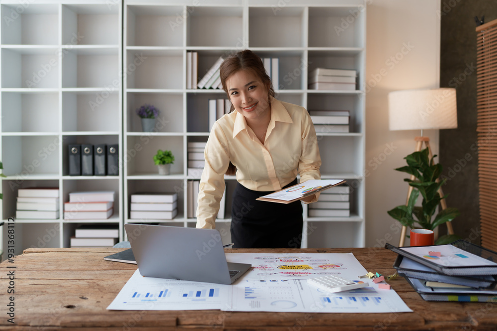 woman plans a finance and budget audit by reviewing organizing Home financial documents woman plans a finance and budget audit by reviewing organizing Home financial documents