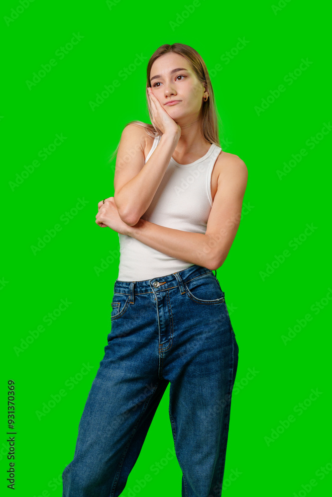 Young Woman With Blonde Hair Posing Against Green Screen Young Woman With Blonde Hair Posing Against Green Screen
