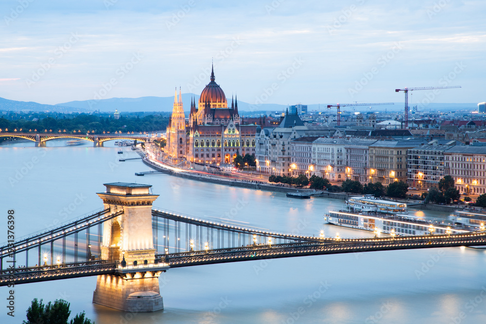 Fototapeta premium panorama of Central Budapest in the evening, with Parliament and Chain Bridge