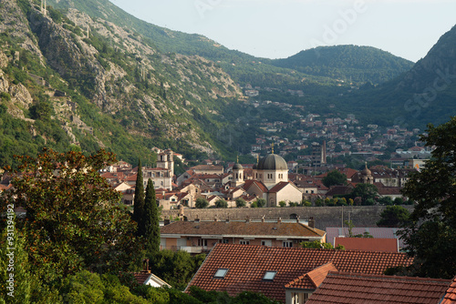 Kotor, Montenegro. View of St. Nicholas Church with mountains in the background