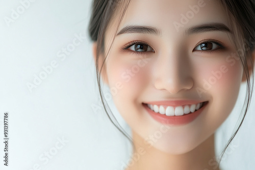 Asian woman positive smile on white background, beauty positive smile