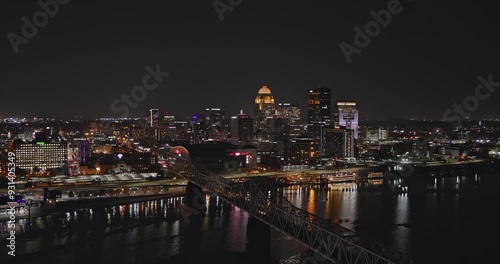 Louisville Kentucky Aerial v26 low flyover Ohio river capturing traffic on Second street bridge and illuminated downtown cityscape on the skyline at night - Shot with Inspire 3 8k - Sept 25th 2023 photo
