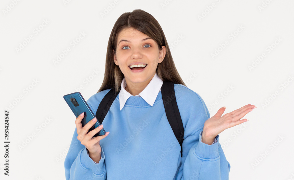 Extremely happy as a winner young woman celebrating victory in bets online casino lottery with money fortune using smart phone cellphone isolated in white background Extremely happy as a winner young woman celebrating victory in bets online casino lottery with money fortune using smart phone cellphone isolated in white background