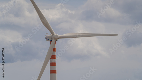 wind turbine in the foreground in the medio campidano wind farm in southern sardinia photo