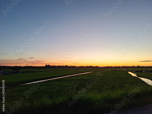 Sunset over the meadows of the Zuidplaspolder photo