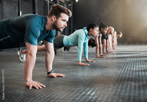 Group, plank and health training for fitness, exercise and gym class, club or core workout for challenge. People, personal trainer or friends collaboration for weight loss, endurance and cardio photo