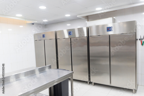 a room with refrigeration equipment for cutting meat.A place to store meat for a restaurant photo