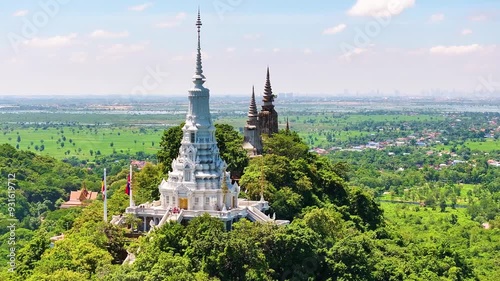 Oudong Temple White Buddha stupa is on top of the mountain, a sacred site for Buddhist tourism in Cambodia. It is near Phnom Penh.