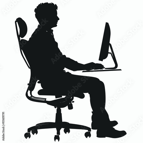Silhouette of a person sitting on an office chair, working on a desktop computer.