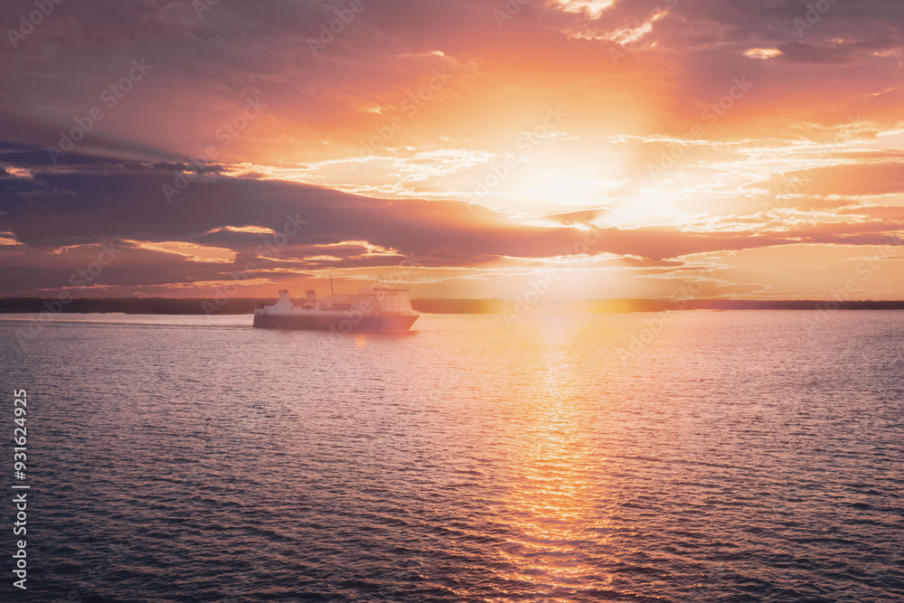 Fototapeta premium Stockholm, Sweden. Tourist Ship Or Ferry Boat Boat Liner Floating Near Islands In Summer Evening. Beautiful Seascape In Sunset Sunrise Time. Sun Sunshine Above Islands Archipelago