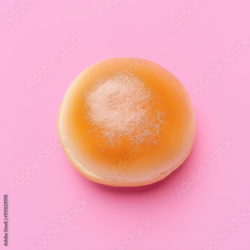 pampushka bun isolated on pink background top view  photo