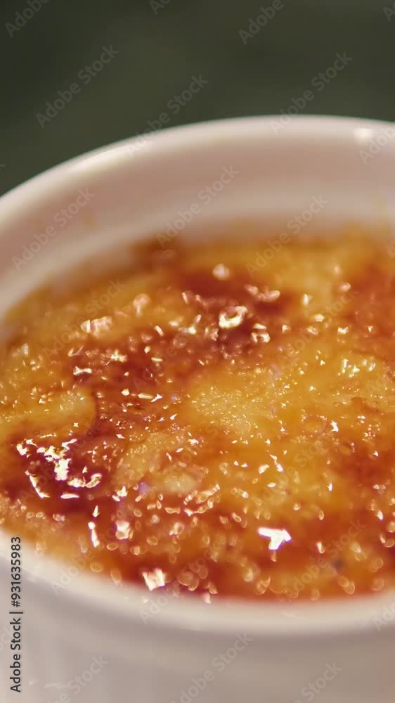 Creme brulee, dessert in oriental cafe. White crockery. Creme brulee, dessert in oriental cafe. White crockery.