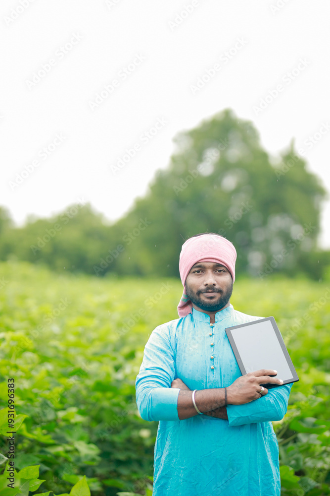 happy young Indian farmer using smart phone happy young Indian farmer using smart phone