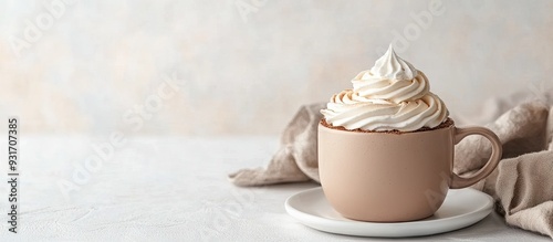 Mug and meringue cake on a ...