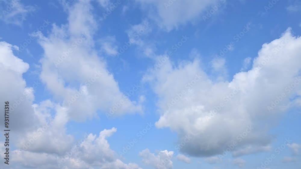 Time lapse, cumulus clouds move across the blue sky Time lapse, cumulus clouds move across the blue sky