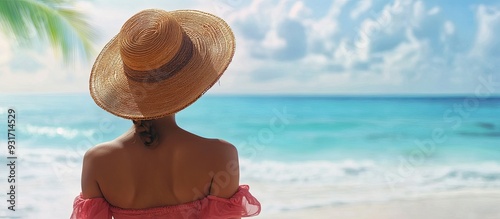 Woman with a straw hat at t...