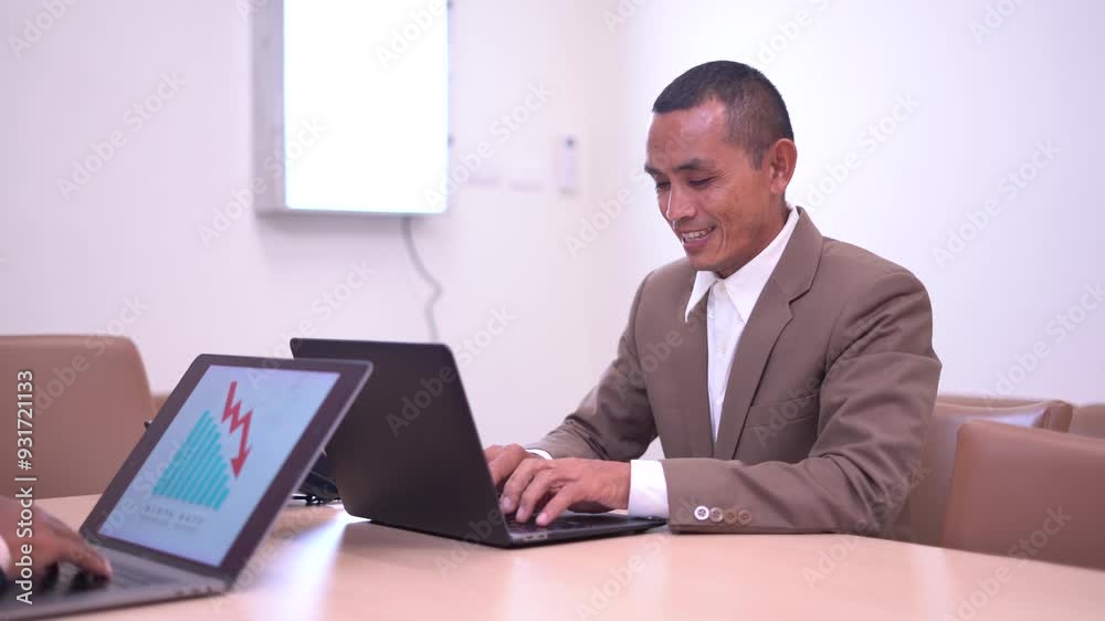 A businessman analyzing declining birth rate data on a laptop in an office, focusing on demographic trends, analysis, and professional research. A businessman analyzing declining birth rate data on a laptop in an office, focusing on demographic trends, analysis, and professional research.