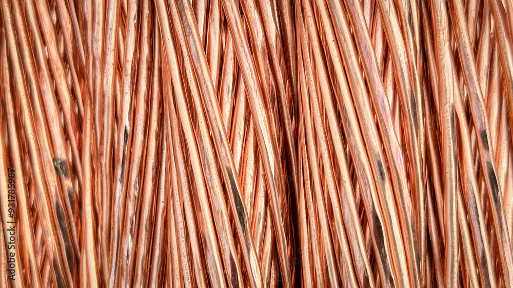 Aligned copper wires displaying consistent patterns and detailed textures in a parallel arrangement. Aligned copper wires displaying consistent patterns and detailed textures in a parallel arrangement.