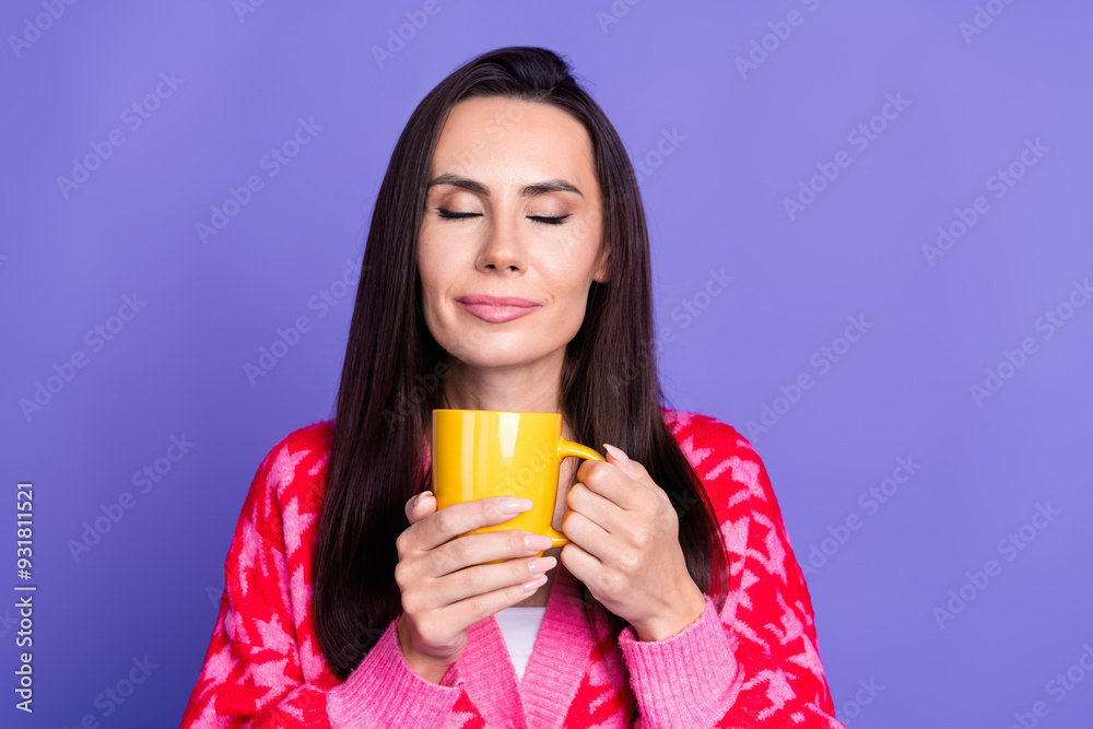 Photo of charming dreamy woman wear pink cardigan enjoy coffee aroma empty space isolated purple color background Photo of charming dreamy woman wear pink cardigan enjoy coffee aroma empty space isolated purple color background