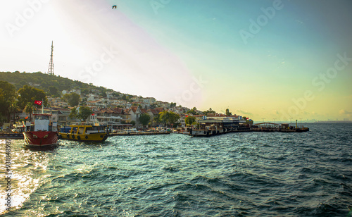 view of the sea and the town of burgazada island in istanbul photo