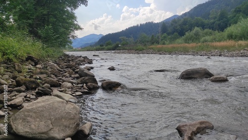 mountain river with stones and fast current