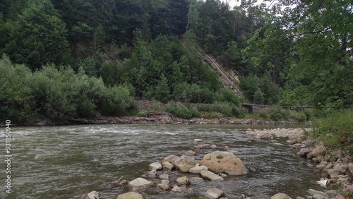 mountain river with stones and fast current