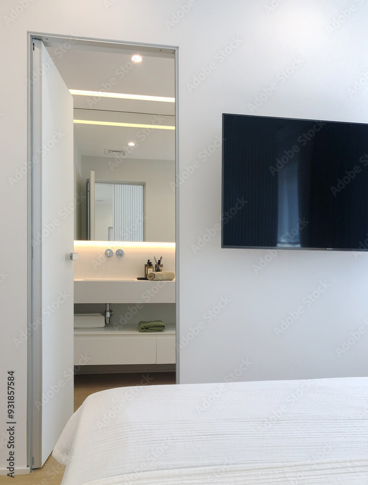Fototapeta premium Modern Bedroom with Ensuite Bathroom and Sleek, Minimalist Design