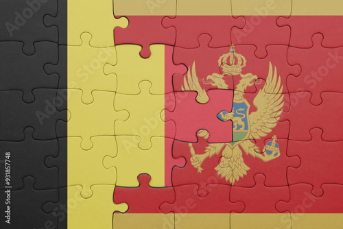 puzzle with the colourful national flag of montenegro and flag of belgium. photo