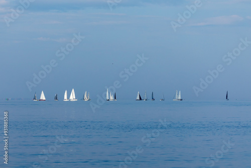 Sailboats race across the Raritan Bay in the area between Staten Island and New Jersey on August 14, 2024.