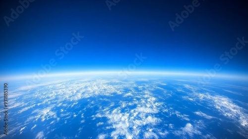 Aerial Perspective A Blue Canvas of Clouds Swirling White Against a Deep Azure Sky Captured from Above