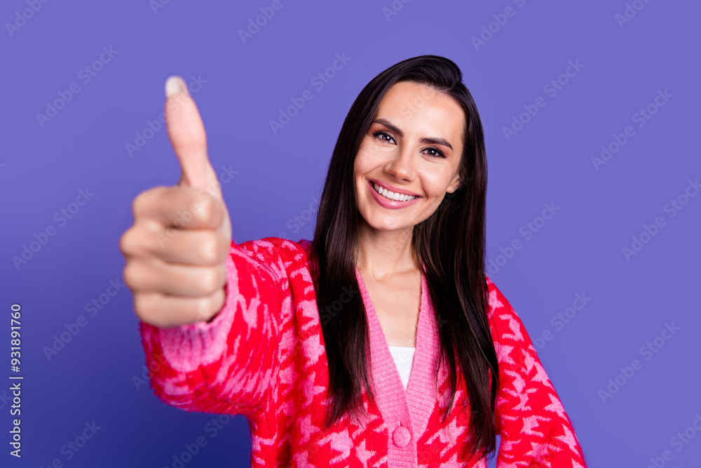 Photo of lovely cute woman wear stylish print clothes thumb up symbol isolated on purple color background Photo of lovely cute woman wear stylish print clothes thumb up symbol isolated on purple color background