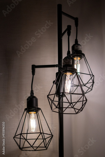 Design lamp with three bulbs.