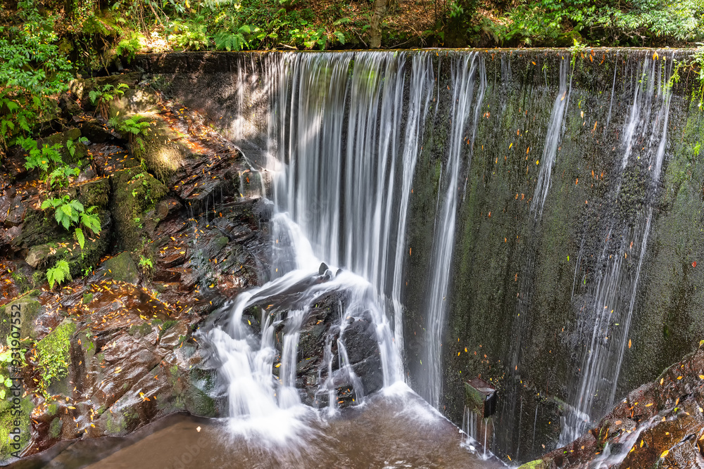 Water dam on a river where a waterfall is produced to feed the water mills for grinding grain, Taramundi, Asturias. Water dam on a river where a waterfall is produced to feed the water mills for grinding grain, Taramundi, Asturias.