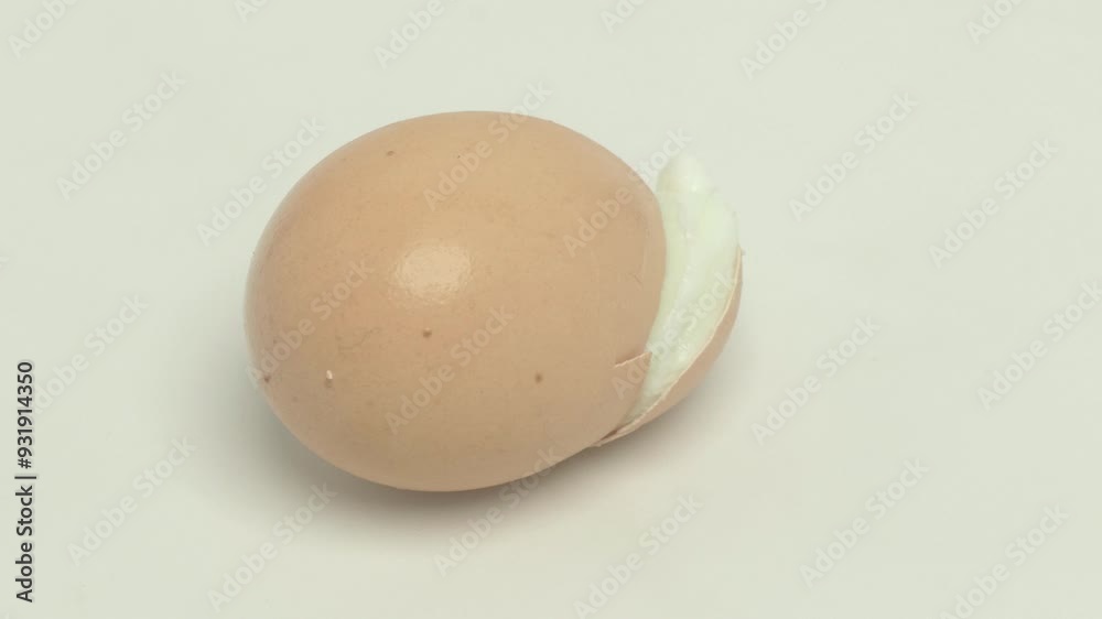 Indulge in a Delicious Cracked Egg, Perfectly Accompanied by Light and Flavorful Whipped Egg White Indulge in a Delicious Cracked Egg, Perfectly Accompanied by Light and Flavorful Whipped Egg White