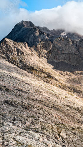 Panoramic views from Eriste Peak: An incomparable view of the Aragonese Pyrenees, where the ibones reflect the beauty of the peaks and valleys that form this unique mountain landscape. photo