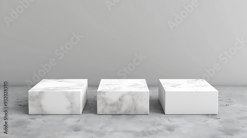 Three Marble Platforms Against a Grey Wall