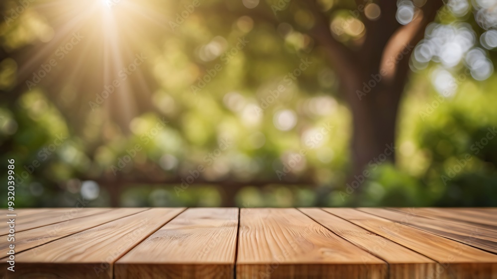 a empty wooden table with blurred garden background a empty wooden table with blurred garden background