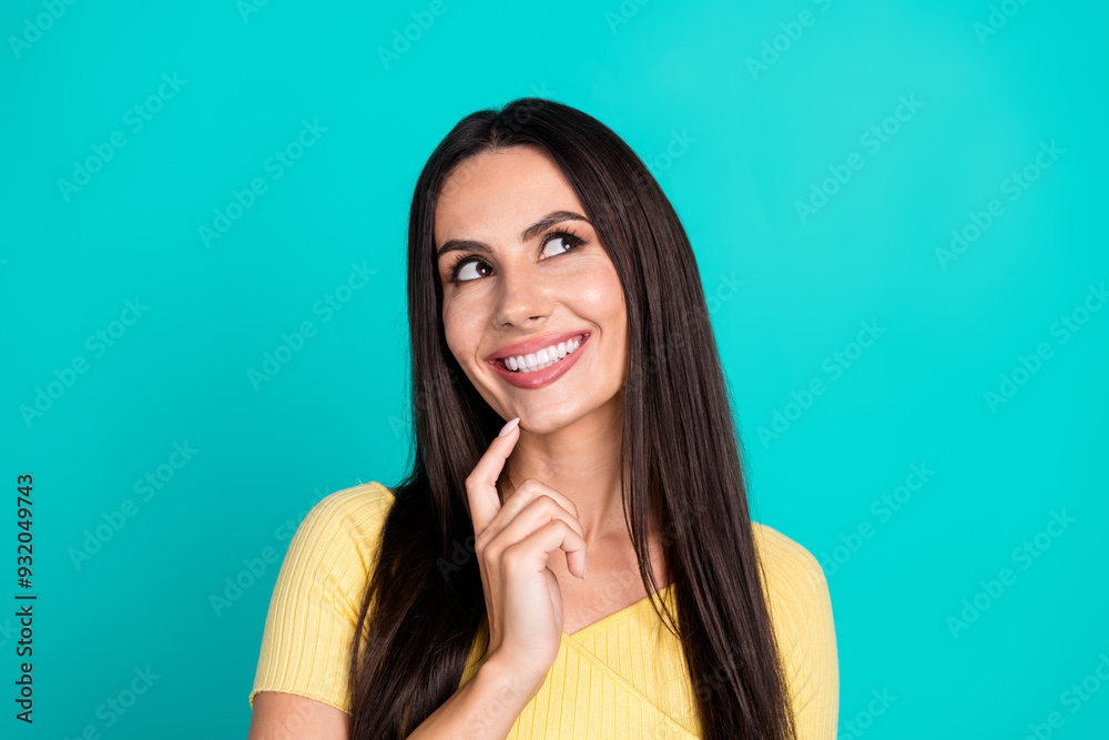 Portrait of pretty young woman look empty space wear top isolated on turquoise color background Portrait of pretty young woman look empty space wear top isolated on turquoise color background