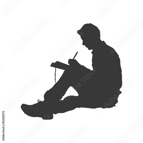 Silhouette of a Person Sitting and Writing in a Notebook