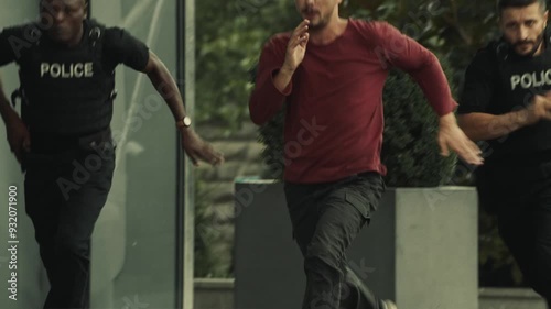 Bald Fugitive running away from the police in the city