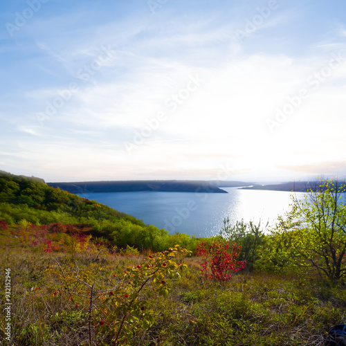 view from high coast to the wide river at the sunset