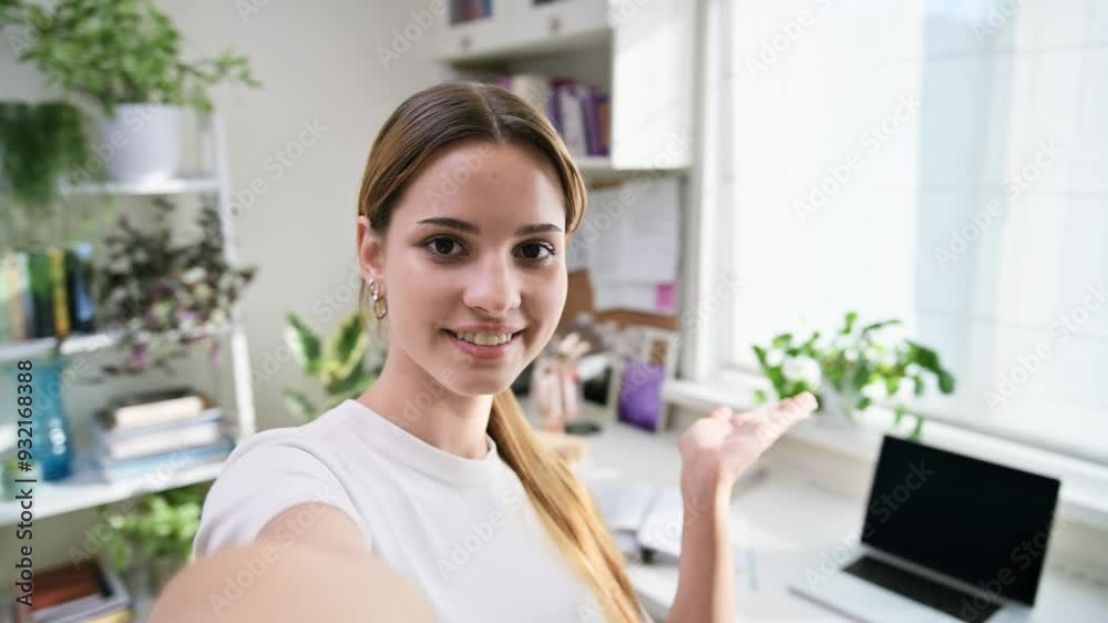 Web camera view of teenage cheerful female, looking at webcam Web camera view of teenage cheerful female, looking at webcam