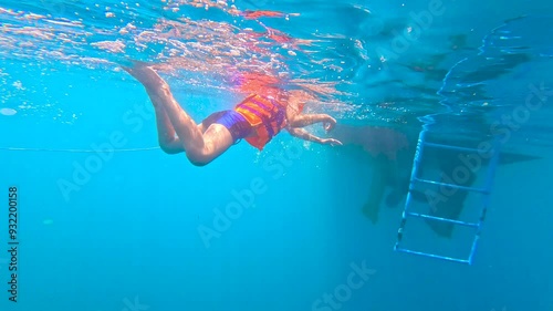 Underwater filming of a person
