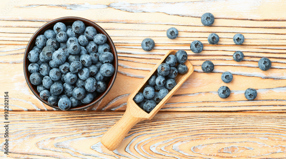 Blueberry photography in a bowl on rustic background Blueberry photography in a bowl on rustic background