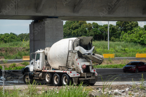 Camion trompo de cemento estacionado en los alrededores de la construcción de metro de Panama Oeste photo