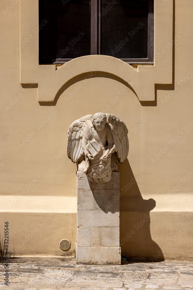 Decorative facade of Roman Catholic Archdiocese of Bari-Bitonto, located next to Bari Cathedral, Bari, Italy, Apulia