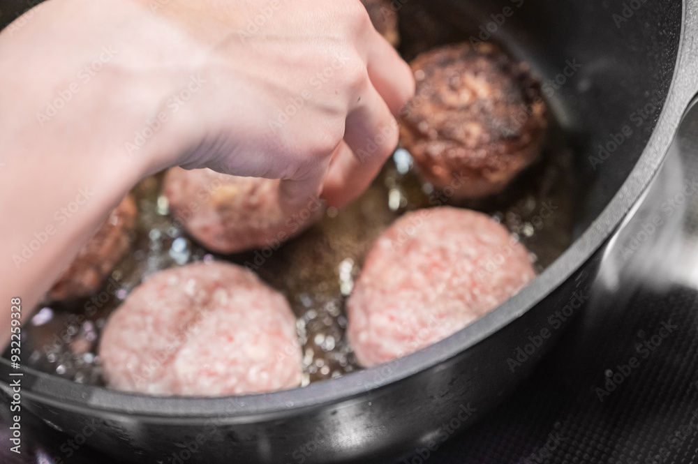 Cooking cutlets. Homemade cutlets are fried in a cauldron.