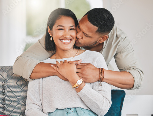Photos Couple, portrait and kiss in home, happiness and love in relationship for weeken